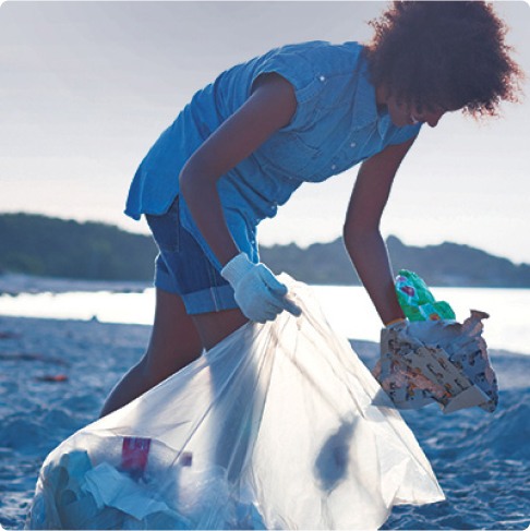 Someone doing beach cleanup